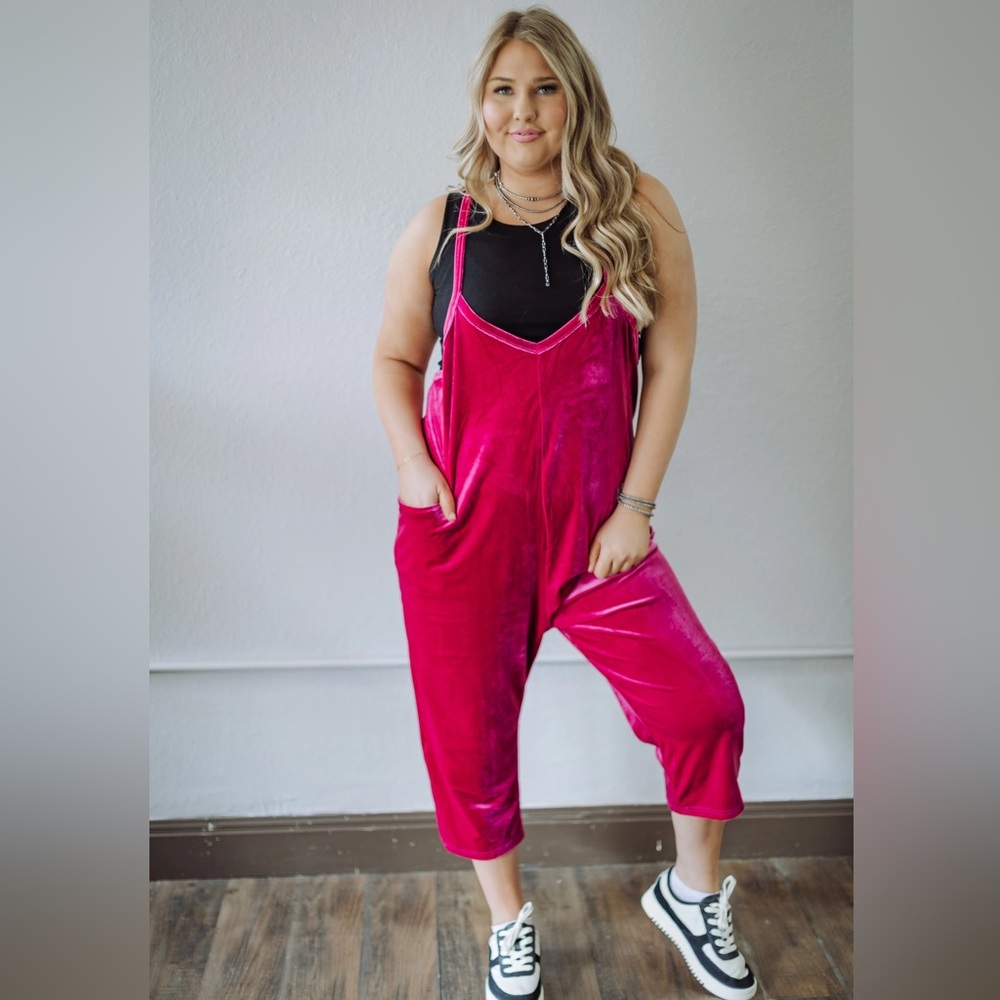 New with tags. Fun velvet romper jumpsuit pinkish purple